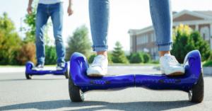 Man and Woman Riding Hoverboards