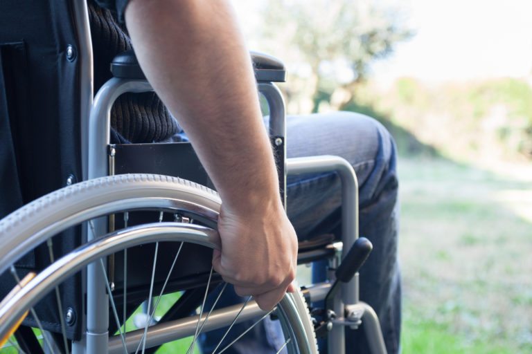 Man Using His Wheelchair in Paralysis - Spinal Cord Injury Lawyers in California - Johnson Attorneys Group