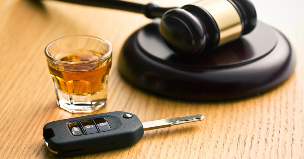 Alchohol Glass and a Car Key - Social Host Liability Law in California - Johnson Attorneys Group